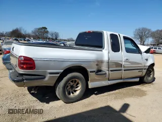 2000 Ford F-150 XL with VIN 2FTRX07L5YCA30151, listed as a Copart auction lot 46751455 with Not provided miles and Salvage title. Bid and sale history available at DreamBid. Image 3.