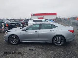 2018 Acura TLX Technology z VIN 19UUB2F52JA001206, wystawiony jako IAAI lot #41498575 z przebiegiem 83 823 mil mil oraz . Historia ofert i sprzedaży dostępna na DreamBid. Obrazek 14.