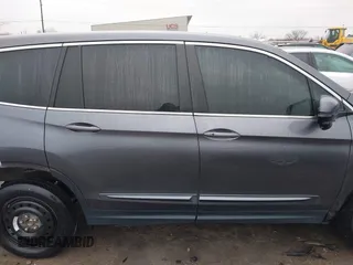 2017 Honda Pilot EX-L with VIN 5FNYF6H55HB063063, listed as a IAAI auction lot 41491193 with 75,444 mi miles and . Bid and sale history available at DreamBid. Image 14.