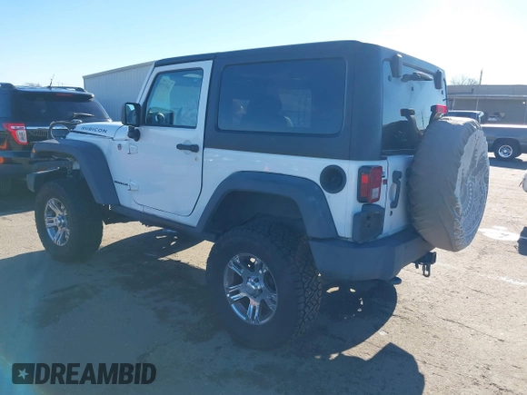 2011 Jeep Wrangler Rubicon with VIN 1J4HA6D17BL620734, listed as a IAAI auction lot 41219266 with 83,796 mi miles and . Bid and sale history available at carsss.com. Image 3.