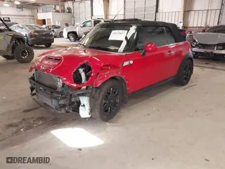 2014 MINI Cooper Convertible S with VIN WMWZP3C59ET298305, listed as a IAAI auction lot 41679657 with 77,736 mi miles. Bid and sale history available at carsss.com. Image 2.