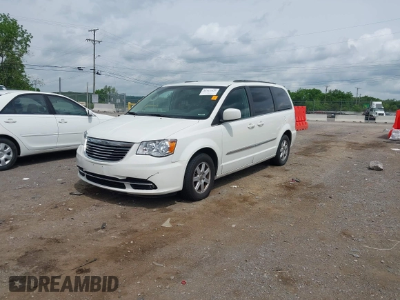 2011 Chrysler Town & Country Touring with VIN 2A4RR5DG9BR775238, listed as a IAAI auction lot 42162442 with 180,408 mi miles and . Bid and sale history available at DreamBid. Image 2.