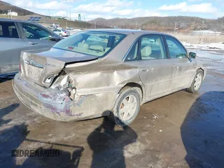 2002 Toyota Avalon XL with VIN 4T1BF28BX2U227129, listed as a IAAI auction lot 41396023 with 126,657 mi miles and . Bid and sale history available at DreamBid. Image 4.