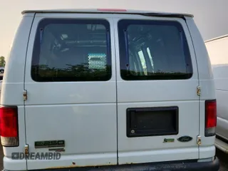 2014 Ford Econoline Cargo Commercial z VIN 1FTNE2EW0EDA95532, wystawiony jako IAAI lot #42442160 z przebiegiem 140 667 mil mil oraz . Historia ofert i sprzedaży dostępna na DreamBid. Obrazek 31.