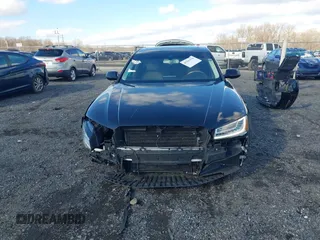 2015 Audi A8 L 4.0T with VIN WAU32AFD4FN014063, listed as a IAAI auction lot 41501970 with 158,570 mi miles. Bid and sale history available at carsss.com. Image 13.