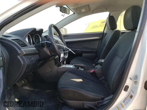 2015 Mitsubishi Lancer ES with VIN JA32U2FU7FU014836, listed as a Copart auction lot 77202064 with 122,576 mi miles and Salvage Title. Bid and sale history available at carsss.com. Image 7.