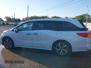 2022 Honda Odyssey Touring with VIN 5FNRL6H85NB058948, listed as a IAAI auction lot 42579157 with 53,669 mi miles and . Bid and sale history available at DreamBid. Image 14.