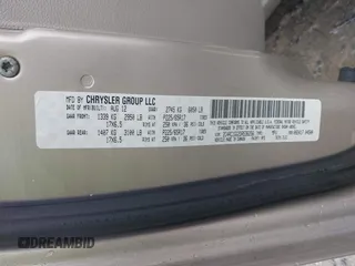 2013 Chrysler Town & Country Limited with VIN 2C4RC1GG2DR536256, listed as a IAAI auction lot 42027427 with 126,447 mi miles. Bid and sale history available at carsss.com. Image 9.