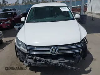 2014 Volkswagen Tiguan SEL with VIN WVGAV3AX0EW524669, listed as a IAAI auction lot 42289003 with 94,513 mi miles and . Bid and sale history available at DreamBid. Image 13.