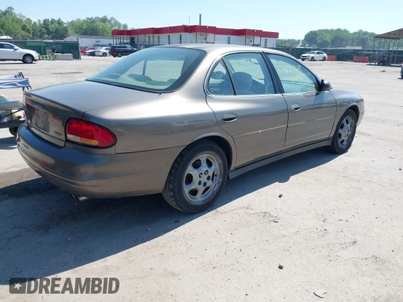 1999 Oldsmobile Intrigue GX z VIN 1G3WH52K5XF334949, wystawiony jako IAAI lot #42252647 z przebiegiem 80 705 mil mil oraz . Historia ofert i sprzedaży dostępna na DreamBid. Obrazek 4.