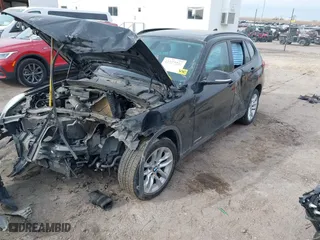 2015 BMW X1 xDrive28i with VIN WBAVL1C57FVY28954, listed as a IAAI auction lot 41857286 with 1 mi miles. Bid and sale history available at carsss.com. Image 2.