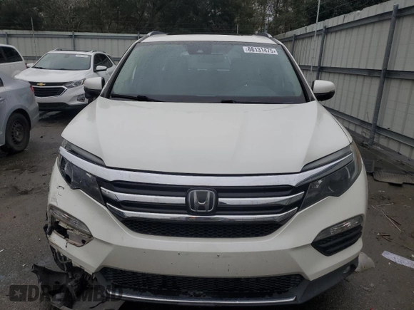 2017 Honda Pilot Touring with VIN 5FNYF6H99HB025600, listed as a Copart auction lot 88131475 with 131,939 mi miles and Salvage Title. Bid and sale history available at DreamBid. Image 5.