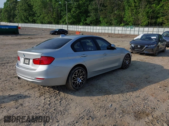 2013 BMW 3 Series 328i with VIN WBA3C1C54DK103415, listed as a IAAI auction lot 42147590 with 113,188 mi miles and . Bid and sale history available at carsss.com. Image 4.