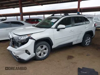 2019 Toyota RAV4 XLE with VIN JTMW1RFV0KD026561, listed as a IAAI auction lot 42035063 with 51,670 mi miles. Bid and sale history available at carsss.com. Image 17.
