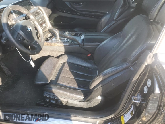 2012 BMW 6 Series 650i z VIN WBALZ3C50CDL70371, wystawiony jako Copart lot #80271534 z przebiegiem 76 332 mil mil oraz Szkody całkowita. Historia ofert i sprzedaży dostępna na DreamBid. Obrazek 7.