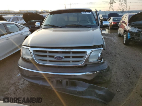 2000 Ford F-150 XL with VIN 1FTRF17W7YNB07289, listed as a Copart auction lot 80981994 with 189,969 mi miles and Salvage title. Bid and sale history available at DreamBid. Image 5.