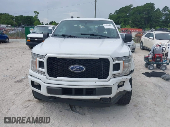 2020 Ford F-150 XL z VIN 1FTEW1EP3LFA05453, wystawiony jako IAAI lot #42644402 z przebiegiem 163 933 mil mil oraz . Historia ofert i sprzedaży dostępna na DreamBid. Obrazek 12.