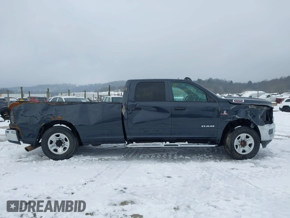 2021 Ram 2500 Tradesman with VIN 3C6UR5HL5MG671238, listed as a IAAI auction lot 41404738 with 60,658 mi miles and . Bid and sale history available at DreamBid. Image 13.
