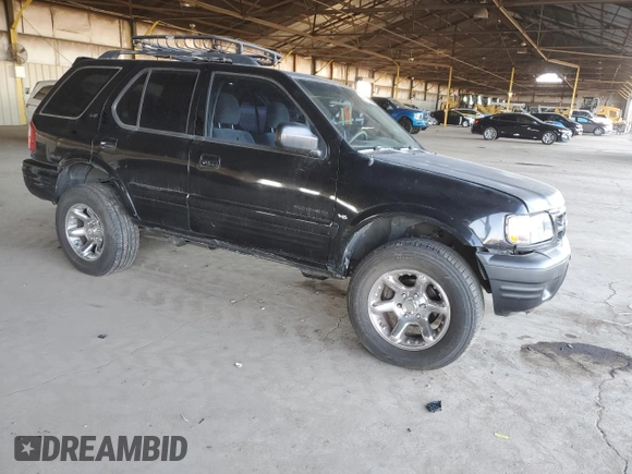2002 Isuzu Rodeo S with VIN 4S2CK58WX24309147, listed as a Copart auction lot 44266155 with 73,935 mi miles and Salvage Title. Bid and sale history available at DreamBid. Image 4.