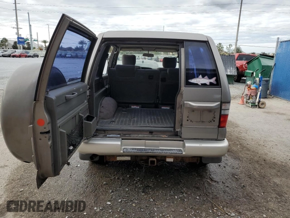 2001 Isuzu Trooper S z VIN JACDS58X617J03960, wystawiony jako Copart lot #86744174 z przebiegiem 78 078 mil mil oraz Nie do naprawy • Non repairable. Historia ofert i sprzedaży dostępna na DreamBid. Obrazek 6.