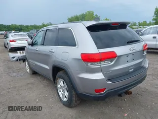 2016 Jeep Grand Cherokee Laredo with VIN 1C4RJFAG3GC366613, listed as a IAAI auction lot 42503974 with 156,013 mi miles and . Bid and sale history available at DreamBid. Image 3.