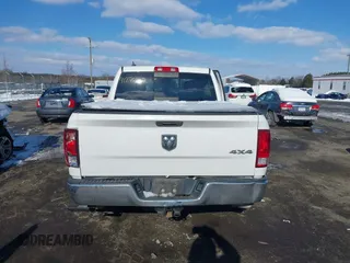 2018 Ram 1500 Big Horn z VIN 1C6RR7LG1JS113662, wystawiony jako IAAI lot #41274107 z przebiegiem 112 500 mil mil oraz . Historia ofert i sprzedaży dostępna na DreamBid. Obrazek 16.