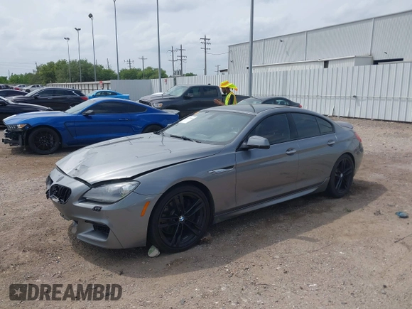 2014 BMW 6 Series 650i z VIN WBA6B2C55ED128934, wystawiony jako IAAI lot #42070641 z przebiegiem 102 597 mil mil oraz . Historia ofert i sprzedaży dostępna na DreamBid. Obrazek 17.