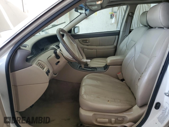 2000 Toyota Avalon XL with VIN 4T1BF28B9YU112742, listed as a Copart auction lot 54719355 with 213,896 mi miles and Salvage Title. Bid and sale history available at DreamBid. Image 7.