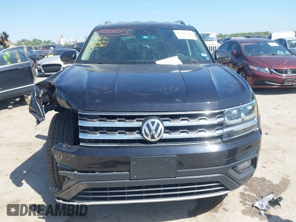 2019 Volkswagen Atlas SE with VIN 1V2WR2CA4KC595211, listed as a IAAI auction lot 41986643 with 96,299 mi miles and . Bid and sale history available at DreamBid. Image 12.
