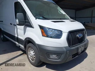 2022 Ford Transit Cargo with VIN 1FTBW3X89NKA69141, listed as a IAAI auction lot 41980864 with 102,721 mi miles and . Bid and sale history available at DreamBid. Image 18.