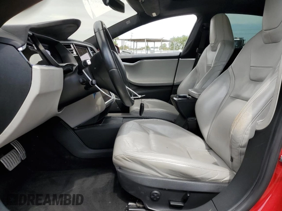 2016 Tesla Model S 90D with VIN 5YJSA1E42GF127593, listed as a Copart auction lot 52450495 with 144,151 mi miles and Salvage title. Bid and sale history available at DreamBid. Image 7.