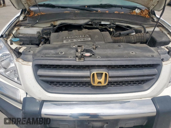 2005 Honda Pilot EX-L z VIN 5FNYF18555B025184, wystawiony jako Copart lot #58084295 z przebiegiem 161 863 mil mil oraz Szkoda całkowita • Salvage title. Historia ofert i sprzedaży dostępna na DreamBid. Obrazek 12.