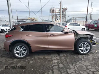 2017 Infiniti QX30 z VIN SJKCH5CP0HA021221, wystawiony jako IAAI lot #41771213 z przebiegiem 88 351 mil mil oraz . Historia ofert i sprzedaży dostępna na DreamBid. Obrazek 14.