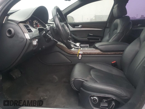 2015 Audi A8 z VIN WAUJGAFD0FN010021, wystawiony jako Copart lot #86861684 z przebiegiem 112 697 mil mil oraz Szkoda całkowita • Salvage title. Historia ofert i sprzedaży dostępna na DreamBid. Obrazek 7.