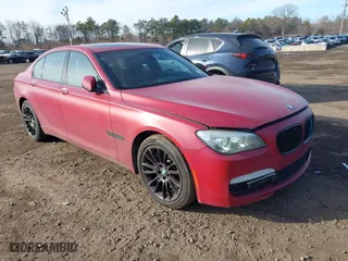 2014 BMW 7 Series 750i xDrive with VIN WBAYB6C55ED224496, listed as a IAAI auction lot 41471012 with 131,851 mi miles. Bid and sale history available at carsss.com. Image 1.