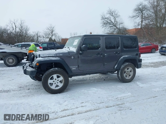 2016 Jeep Wrangler Unlimited Rubicon with VIN 1C4BJWFG7GL192698, listed as a IAAI auction lot 41603236 with 69,620 mi miles. Bid and sale history available at carsss.com. Image 14.
