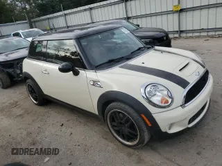 2007 MINI Hardtop S with VIN WMWMF735X7TL83242, listed as a Copart auction lot 41609565 with 83,320 mi miles and Salvage Title. Bid and sale history available at DreamBid. Image 4.