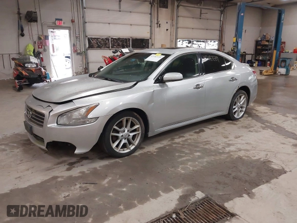 2011 Nissan Maxima SV with VIN 1N4AA5AP4BC802777, listed as a IAAI auction lot 42183339 with 164,807 mi miles and . Bid and sale history available at DreamBid. Image 2.