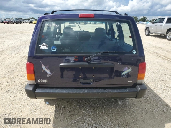 1998 Jeep Cherokee Sport with VIN 1J4FJ68S1WL149793, listed as a Copart auction lot 73976814 with 0 mi miles and Salvage Title. Bid and sale history available at carsss.com. Image 6.