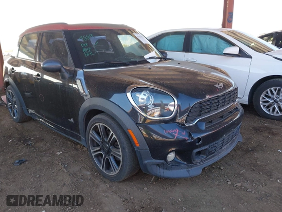 2014 MINI Countryman S with VIN WMWZC5C57EWP39919, listed as a IAAI auction lot 41613909 with 139,138 mi miles and . Bid and sale history available at DreamBid. Image 1.