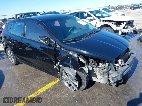 2015 Hyundai Accent Sport with VIN KMHCU5AE8FU233131, listed as a IAAI auction lot 41360461 with 99,480 mi miles. Bid and sale history available at carsss.com. Image 1.