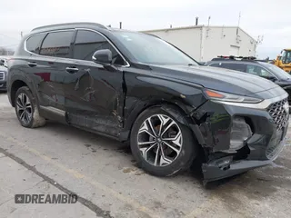 2019 Hyundai Santa Fe Ultimate with VIN 5NMS5CAA8KH019109, listed as a IAAI auction lot 41120391 with 101,829 mi miles and . Bid and sale history available at DreamBid. Image 6.