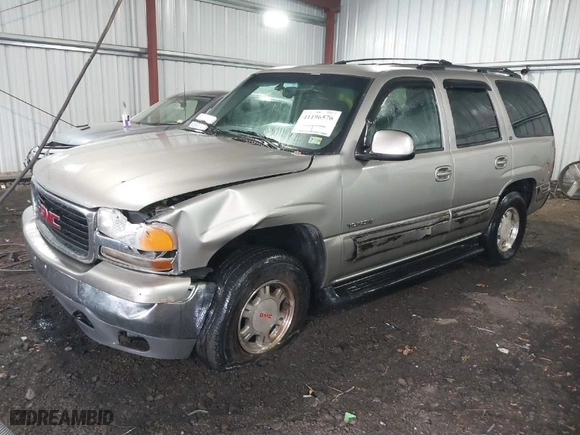 2001 GMC Yukon SLT with VIN 1GKEC13T91J202831, listed as a IAAI auction lot 41196576 with 252,478 mi miles. Bid and sale history available at carsss.com. Image 2.
