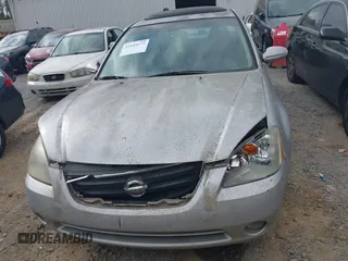 2002 Nissan Altima SE with VIN 1N4BL11D22C276694, listed as a IAAI auction lot 41949577 with 170,000 mi miles. Bid and sale history available at carsss.com. Image 12.