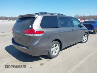 2012 Toyota Sienna LE AAS with VIN 5TDKK3DC8CS269924, listed as a IAAI auction lot 41764722 with 176,968 mi miles. Bid and sale history available at carsss.com. Image 4.