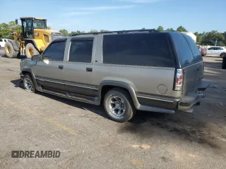 1999 Chevrolet Suburban with VIN 1GNEC16R9XJ490863, listed as a Copart auction lot 65938594 with 176,391 mi miles and Salvage Title. Bid and sale history available at carsss.com. Image 2.