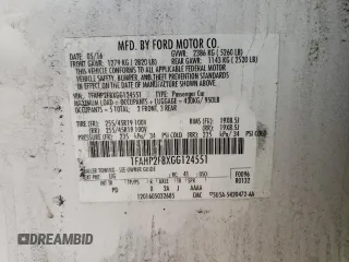 2016 Ford Taurus Limited with VIN 1FAHP2F8XGG124551, listed as a Copart auction lot 60621695 with 103,668 mi miles and Salvage title. Bid and sale history available at DreamBid. Image 12.