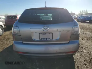 2011 Mazda CX-7 S Grand Touring z VIN JM3ER4D32B0379567, wystawiony jako Copart lot #79163864 z przebiegiem 142 292 mil mil oraz Czysty tytuł • Clean title. Historia ofert i sprzedaży dostępna na DreamBid. Obrazek 6.