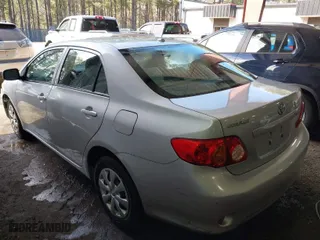 2010 Toyota Corolla with VIN 1NXBU4EE7AZ215390, listed as a IAAI auction lot 41706835 with 174,358 mi miles. Bid and sale history available at carsss.com. Image 3.