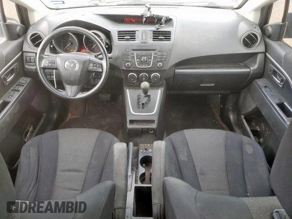 2012 Mazda 5 Sport with VIN JM1CW2BL6C0120288, listed as a Copart auction lot 60252315 with 127,494 mi miles and Salvage title. Bid and sale history available at DreamBid. Image 8.